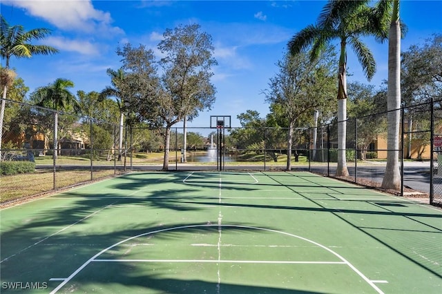 view of sport court with community basketball court and fence