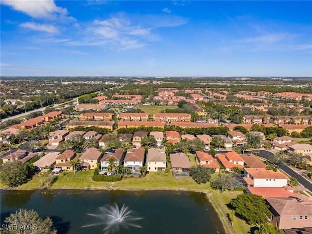 aerial view featuring a water view and a residential view