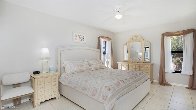 bedroom featuring ceiling fan and light tile patterned floors