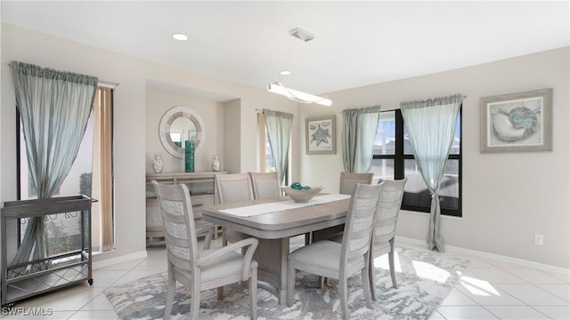 dining space with light tile patterned floors