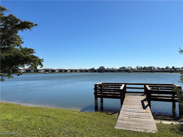 dock area featuring a water view