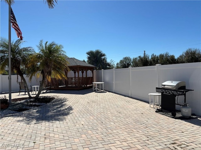 view of patio featuring a gazebo and area for grilling