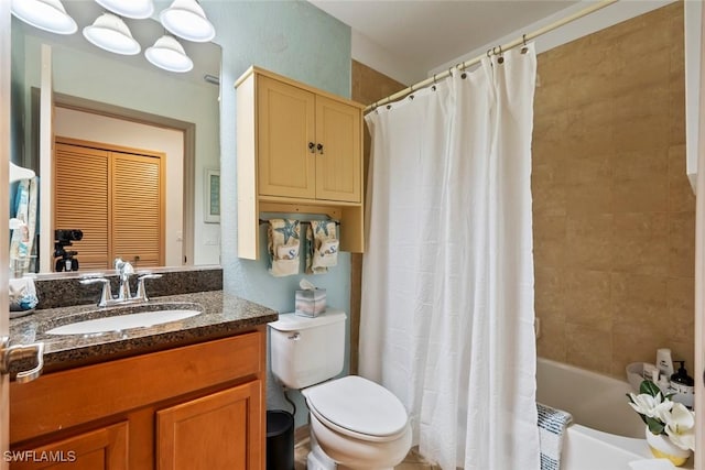 full bathroom with shower / bath combination with curtain, vanity, and toilet