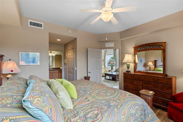 bedroom with ceiling fan and a closet