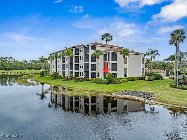 view of building exterior featuring a water view