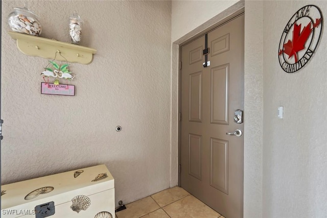 interior space featuring light tile patterned flooring