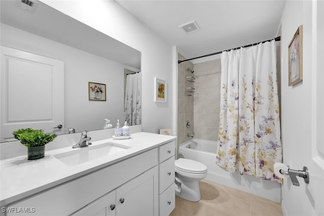 full bathroom featuring toilet, shower / tub combo with curtain, vanity, and tile patterned flooring