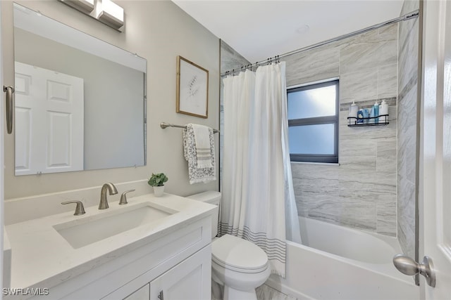 full bathroom featuring toilet, vanity, and shower / bath combo with shower curtain