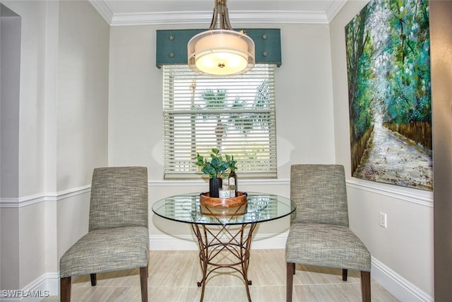 living area featuring ornamental molding