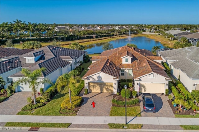 drone / aerial view featuring a water view