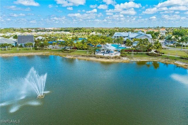 drone / aerial view with a water view