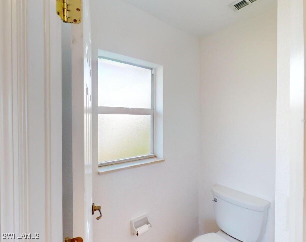 bathroom featuring toilet