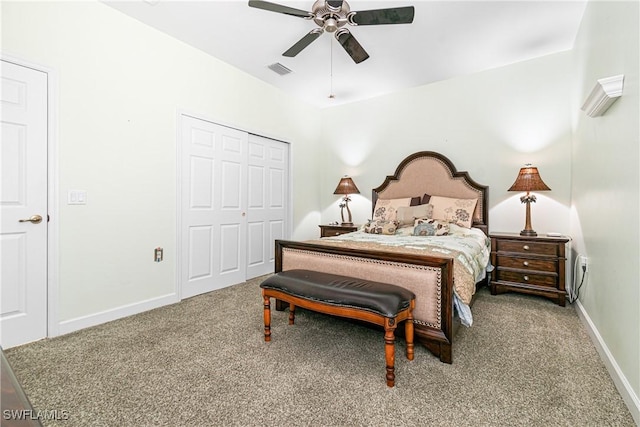 bedroom featuring ceiling fan, a closet, and carpet