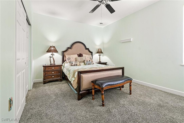 carpeted bedroom with ceiling fan and a closet