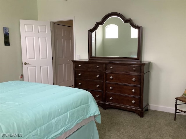 bedroom featuring light colored carpet