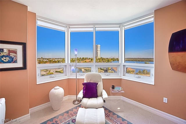 sitting room with light tile patterned flooring