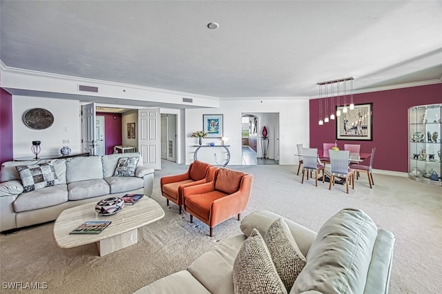 living room featuring crown molding and light colored carpet