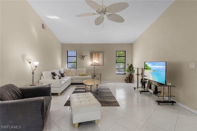 living room featuring ceiling fan and light tile patterned flooring