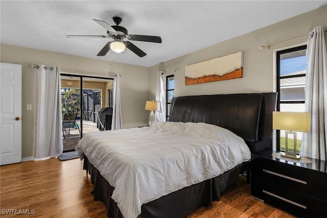 bedroom featuring access to outside, ceiling fan, and hardwood / wood-style flooring