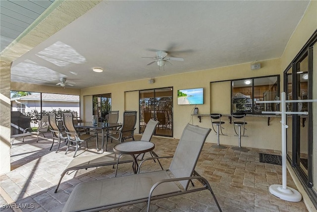 view of patio / terrace with ceiling fan