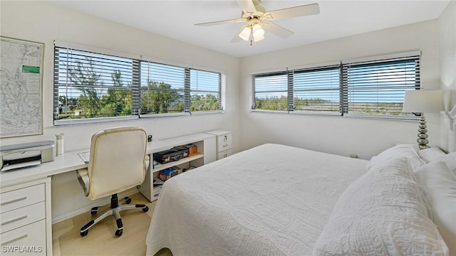 bedroom with hardwood / wood-style flooring and ceiling fan