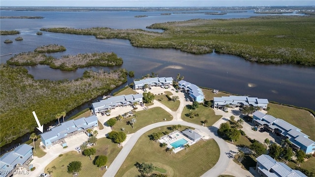 drone / aerial view featuring a water view