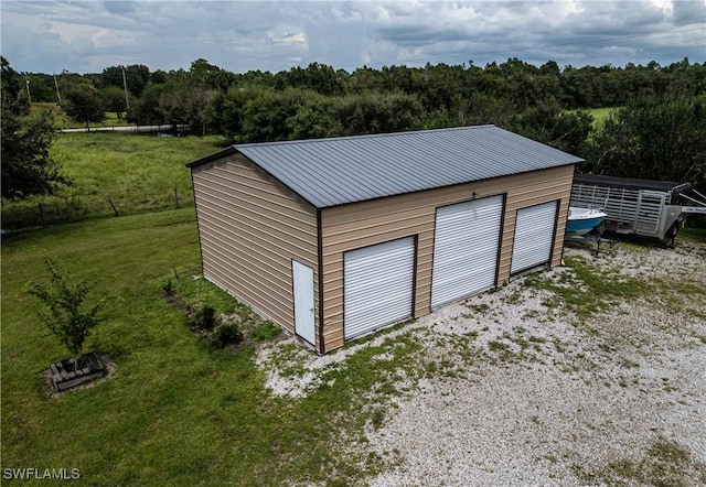 garage with a lawn