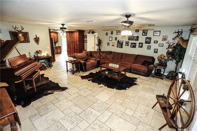 living room featuring ceiling fan