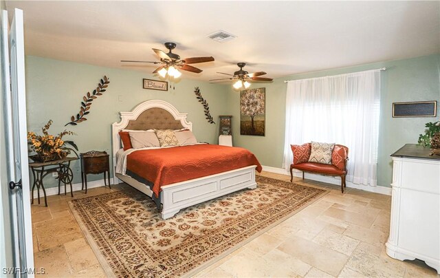 bedroom featuring ceiling fan