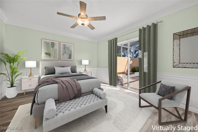 bedroom featuring ceiling fan, access to exterior, crown molding, and hardwood / wood-style flooring