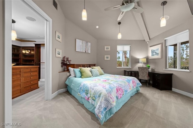 bedroom with lofted ceiling, visible vents, and light colored carpet