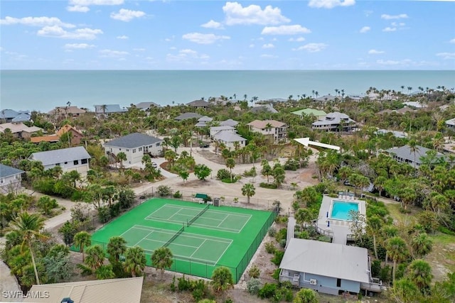 bird's eye view featuring a water view and a residential view