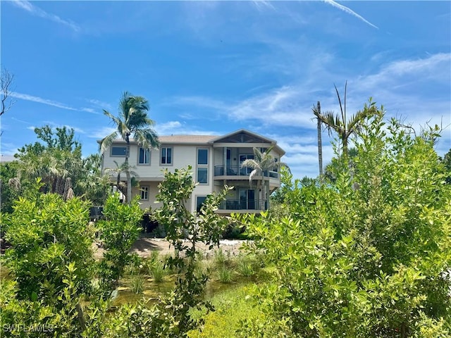 4353 Gulf Pines Dr, Sanibel, FL 33957 - back of property with a balcony