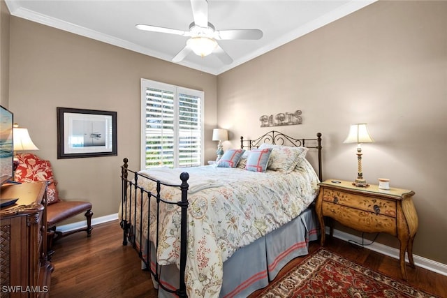 bedroom with ceiling fan, dark wood-type flooring, and ornamental molding