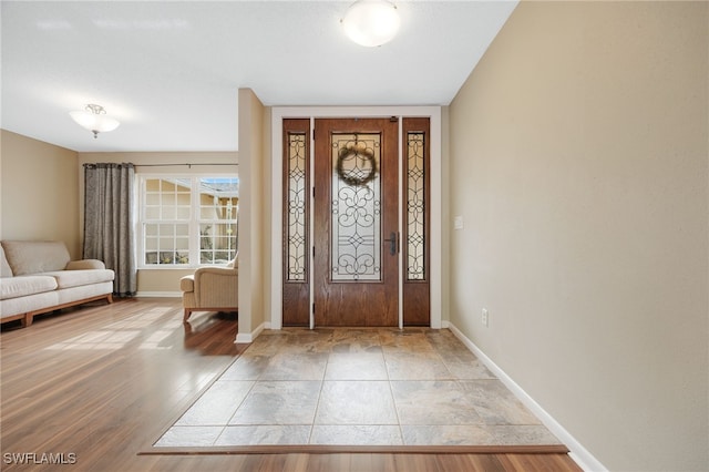 entryway with light wood-type flooring