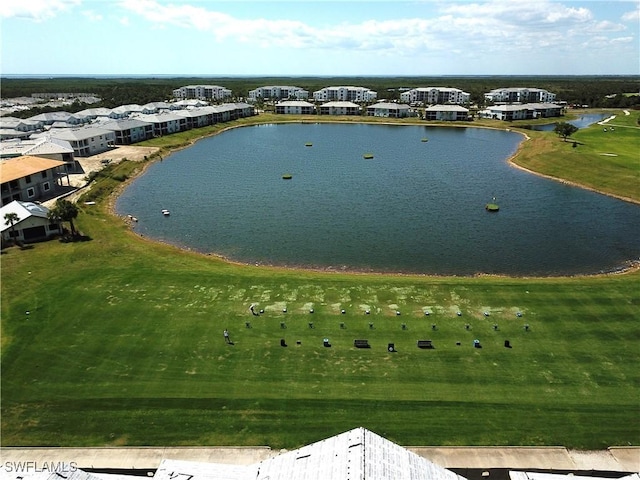 drone / aerial view with a water view