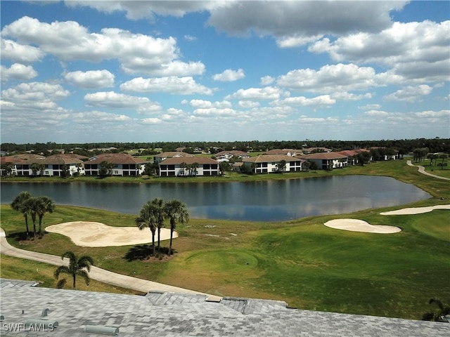 view of water feature featuring a residential view and view of golf course