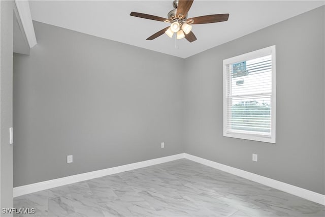 empty room featuring ceiling fan