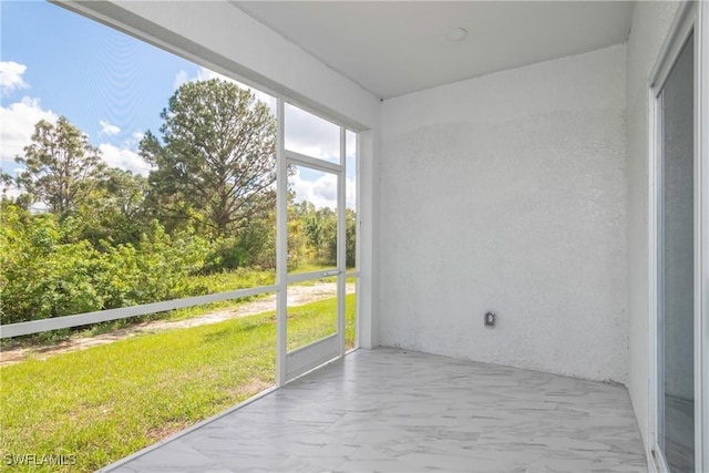 view of unfurnished sunroom