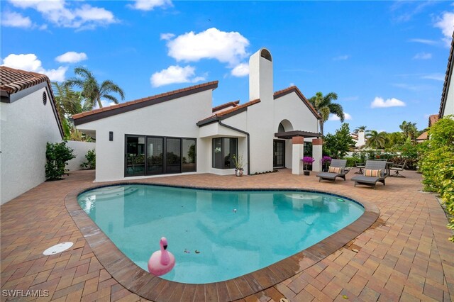 view of pool with a patio