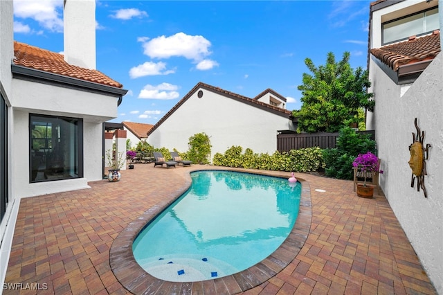 585 Bay Villas Ln Unit 88, Naples, FL 34108 - outdoor pool with fence and a patio