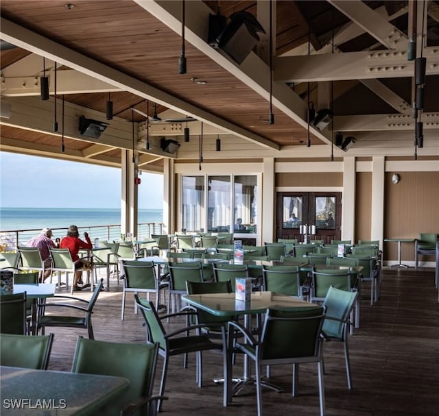 view of patio with a water view