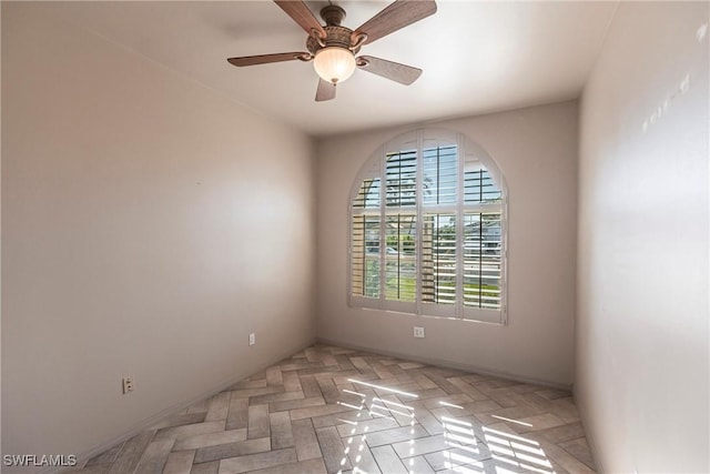 empty room with ceiling fan