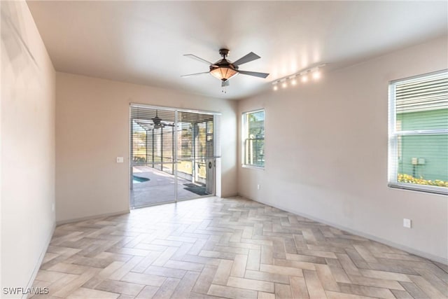 empty room featuring ceiling fan