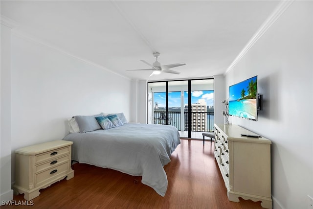 bedroom featuring hardwood / wood-style floors, a wall of windows, ornamental molding, access to exterior, and ceiling fan