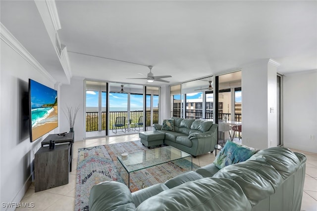 living room featuring light tile patterned floors, crown molding, floor to ceiling windows, and ceiling fan