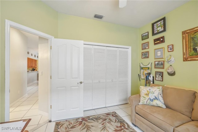 living area featuring light tile patterned floors