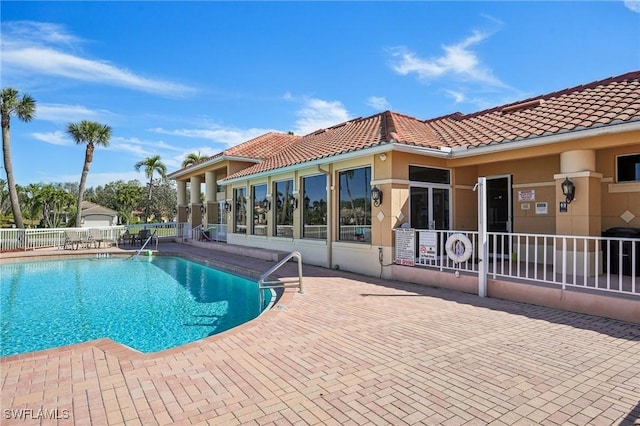 view of pool featuring a patio