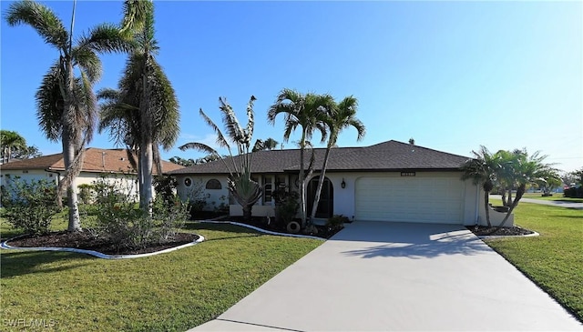 single story home featuring a garage and a front lawn