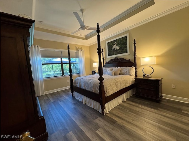 bedroom with ceiling fan, crown molding, and dark hardwood / wood-style floors